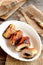 Roasted Turkey breast rolls with cheese and agaricus. Festive food recipe. Rustic style. Vertical photo