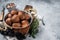 Roasted Vegan Lentil Meatballs in a skillet. Gray background. Top view. Copy space