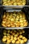 Roasted whole mini potatoes in an oven tray