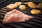 Roasting Fuming Raw Chicken or Turkey Meat Fillet and Potatoes Seasoned with Spices on Electric Grill Plate