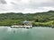 Roatan, Honduras, -11/29/17 - Views of a marina on the ocean with mountains in the background