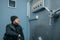 Robber in black uniform sitting at the vault door