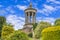 Robert Burns Monument Ayr. on a summers day with blue sky and white light clouds.