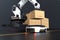 The Robot arm picks up the box to Autonomous Robot transportation in warehouses, Warehouse automation concept