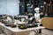 Robot cleaning the food from the table in the restaurant. Futuristic concept. Generated AI