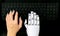 Robot concept chatbot of Human hand and robot hand pressing computer keyboard