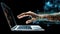 Robot hand opening up a laptop, futuristic design, on dark background