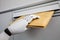 Robot Inserting Envelope In Mailbox