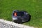 Robot lawnmower mows lawn, top view