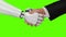 Robot and Man Shaking Hands. Beautiful realistic 3d animation on a green background with a pass of depth of field.