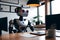 A robot in an office typing facing screen with coffee generated by ai