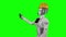 Robot in an orange helmet invites workers to his office. Green screen. Side view. Slow motion