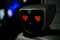 Robot with red eyes heart shape. Future, love and robotic concept. Love robot