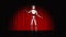 A robot stands on a stage with a red curtain