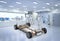 Robot study or research ev car with pack of battery cells module on platform