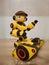 Robot toy yellow red smile