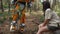 Robot transformer Bumblebee and girl are together among forest