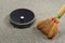 Robot vacuum cleaner and old broom