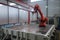 robotic painting and coating system, with a view of the factory floor, in action