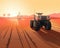 A robotic tractor races across a farm field its sensors collecting vast amounts of data to determine optimal planting