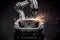 Robotic welder in automotive industry, white robot welding car body in car factory