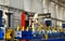 Robotic welding complex in the production workshop of an industrial plant. Complex production line, industrial robot in the