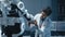 In Robotics Development Laboratory: Top Male Scientist Works on a Bionics Exoskeleton Prototype. T