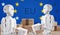 Robots shipping boxes in front of creative abstract flag of Europe 3d-illustration