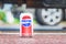 Rochester, USA. June 17, 2018. Metal can of pepsi cola on car background
