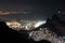 Rocinha Slum at Night and Ipanema District Behind the Mountains