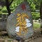 A rock architecture statue in a park. Translation: dragon