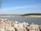 Rock barrier and sand islands with willow trees Danube river