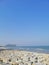 Rock beach with clearly sky and blue sea