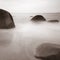 Rock and blur wave scenery on beach