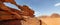 Rock bridge and panoramic view of Wadi Rum