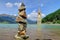 Rock Cairn near underwater church tower in Reschensee Lake, Ital
