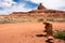 Rock cairns and the Mexican Hat rock formation in the Utah desert of the Four Corners region