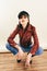 Rock chick in leather jacket, full length. Fashion portrait of elegant woman, studio shot