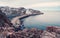 A rock cliff above the water with a tidal shoreline. Wonderful panoramic mountain landscape on the Barents sea