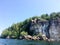 Rock Cliff Face Forested Hill on a Lake