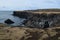 Rock Cliffs and Basalt Columns Along the Coast of Iceland