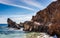 Rock cliffs at Playa del Papagayo Parrot Beach. Lanzarote, Canary Islands, Spain.