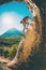 Rock climber on the background of beautiful mountains and blue sky