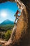 Rock climber on the background of beautiful mountains and blue sky