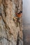 Rock climber on a challenging ascent. Extreme climbing.