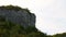 Rock climber climbs the rock.