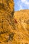 Rock climber on a steep rock.