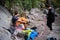 Rock climbing team prepare a challenging ascent. Climber and belayer.