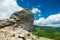 Rock, clouds and blue sky