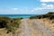 Rock Covered Oceanside Road